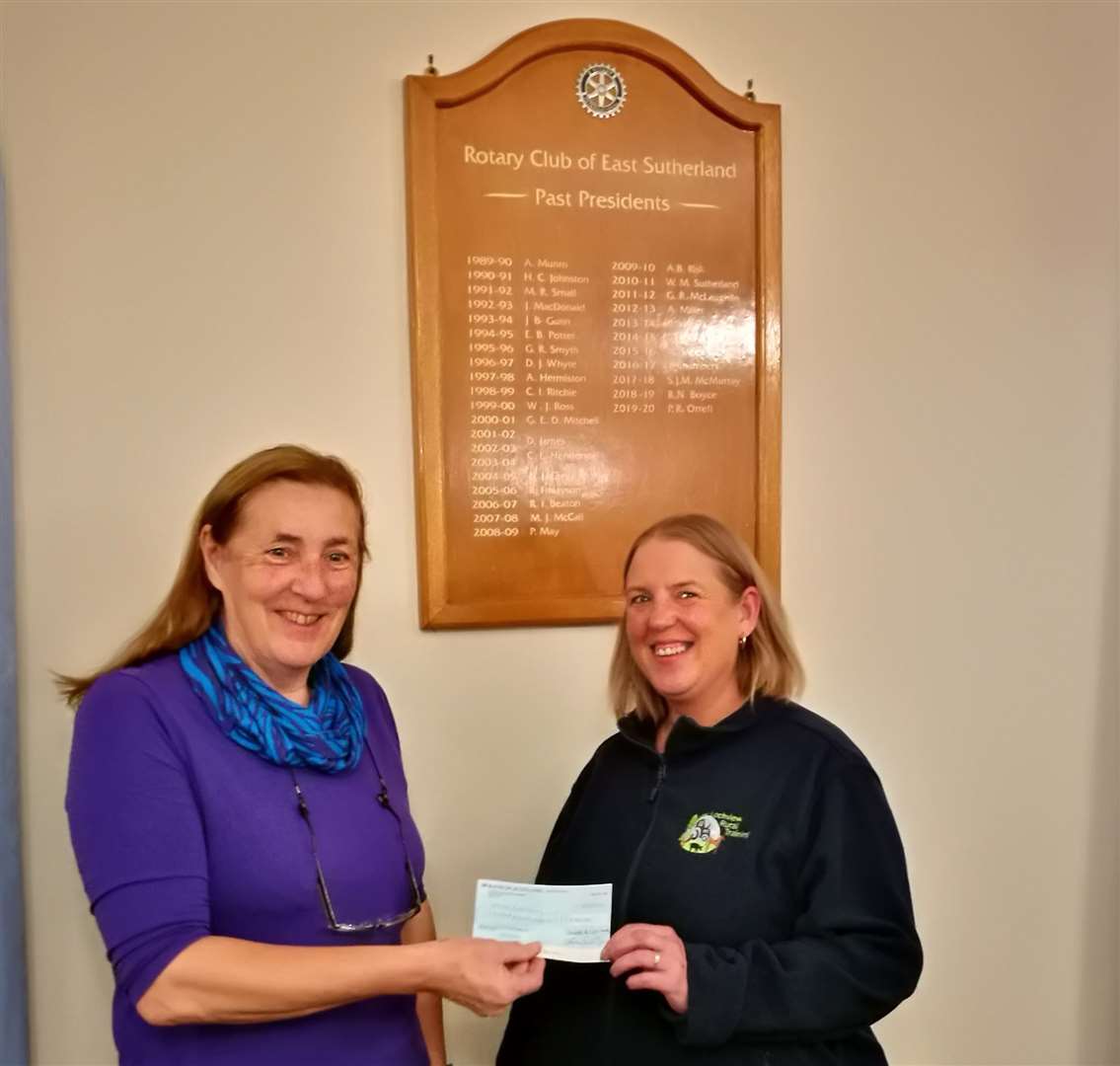 Rotary club president Elizabeth Sweetman presents a £500 cheque to Cara Cameron of Lochview Rural Training Centre.