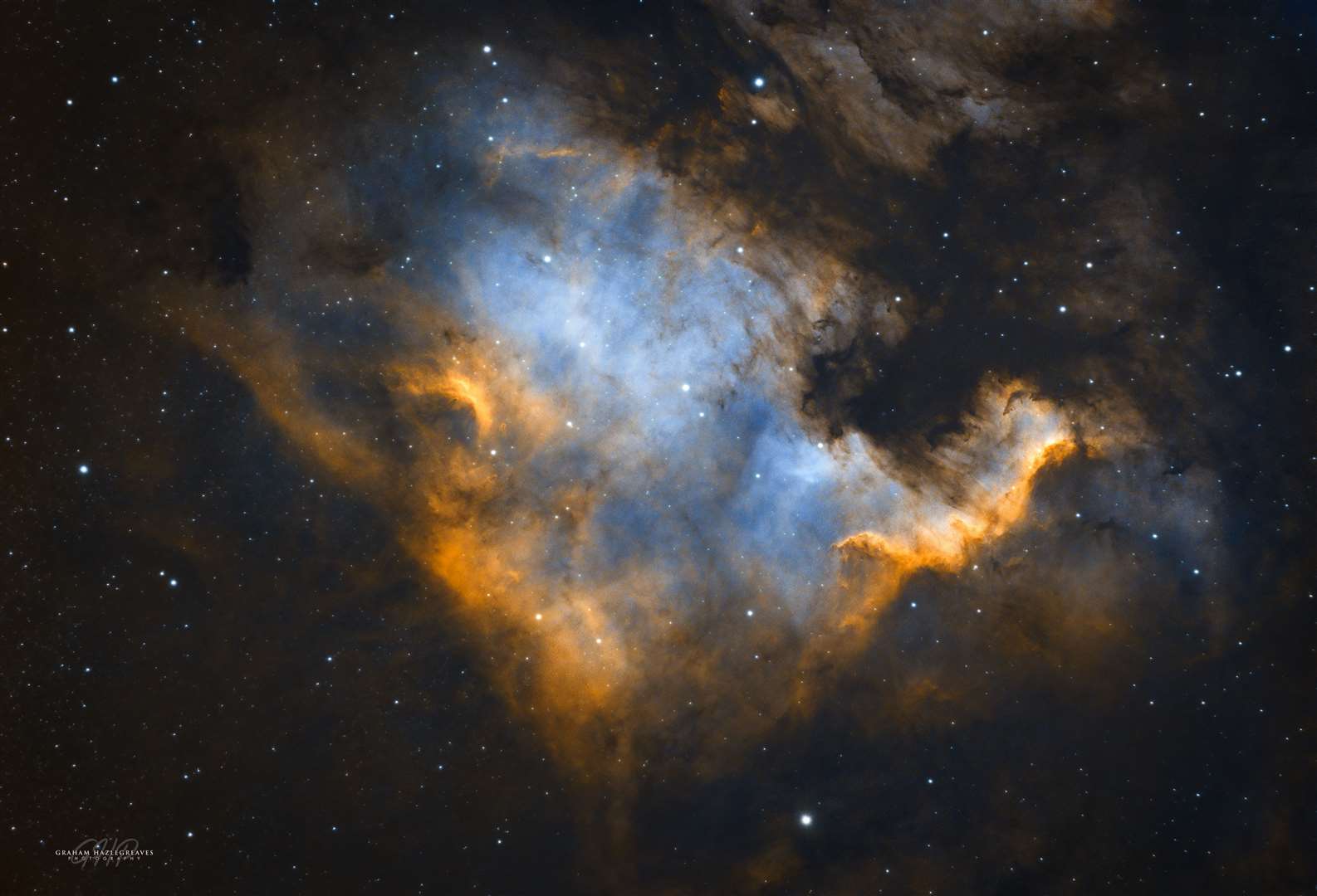 The North America Nebula (NGC7000) is an emission nebula located in the constellation of Cygnus (The Swan). The nebula resembles the shape of the North America Continent. The nebula is some 2,590 light years distant, 90 light years north to south and 140 light years across.