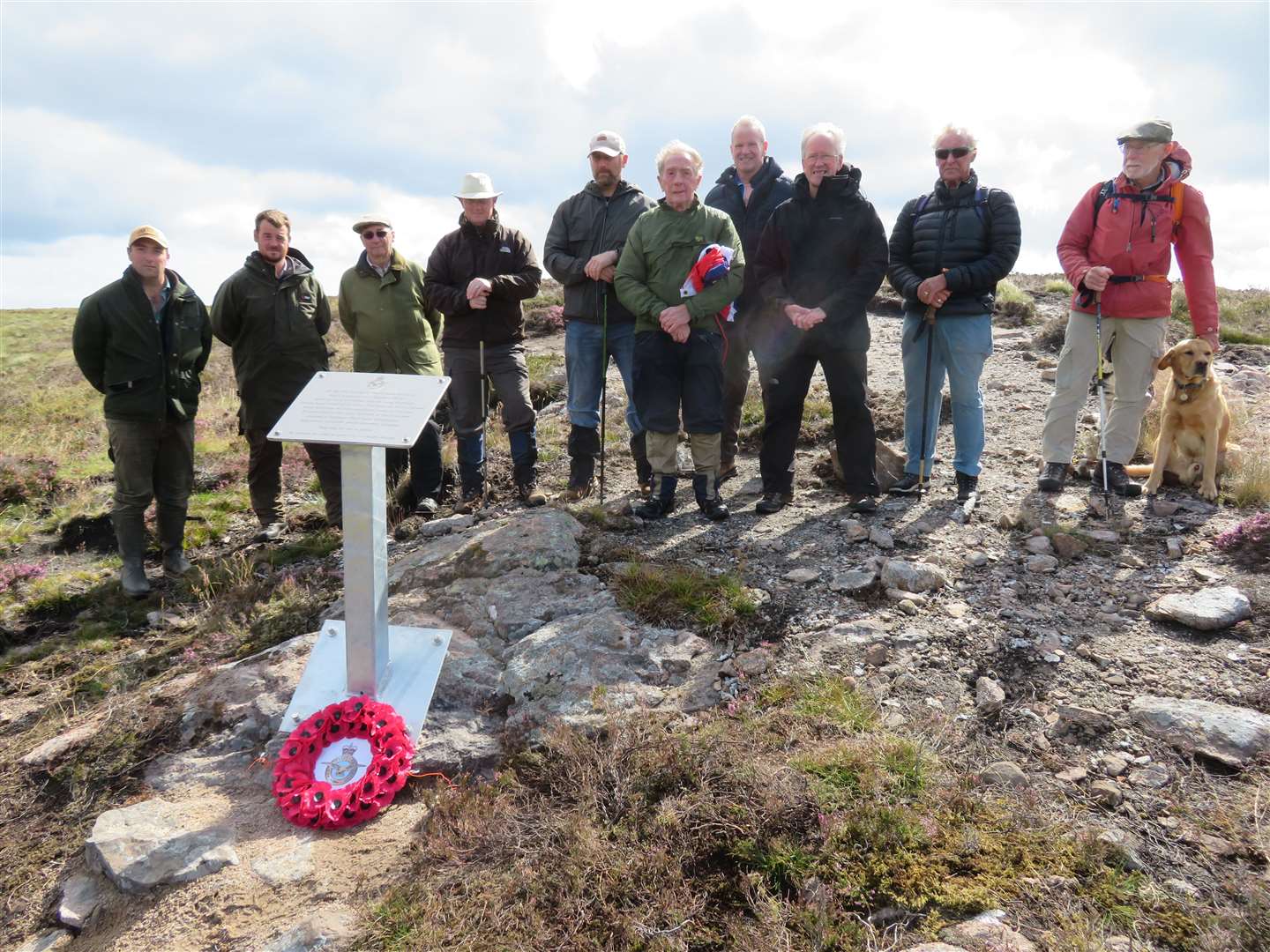 The group following the installation of the plaque at Creag Riabhach.