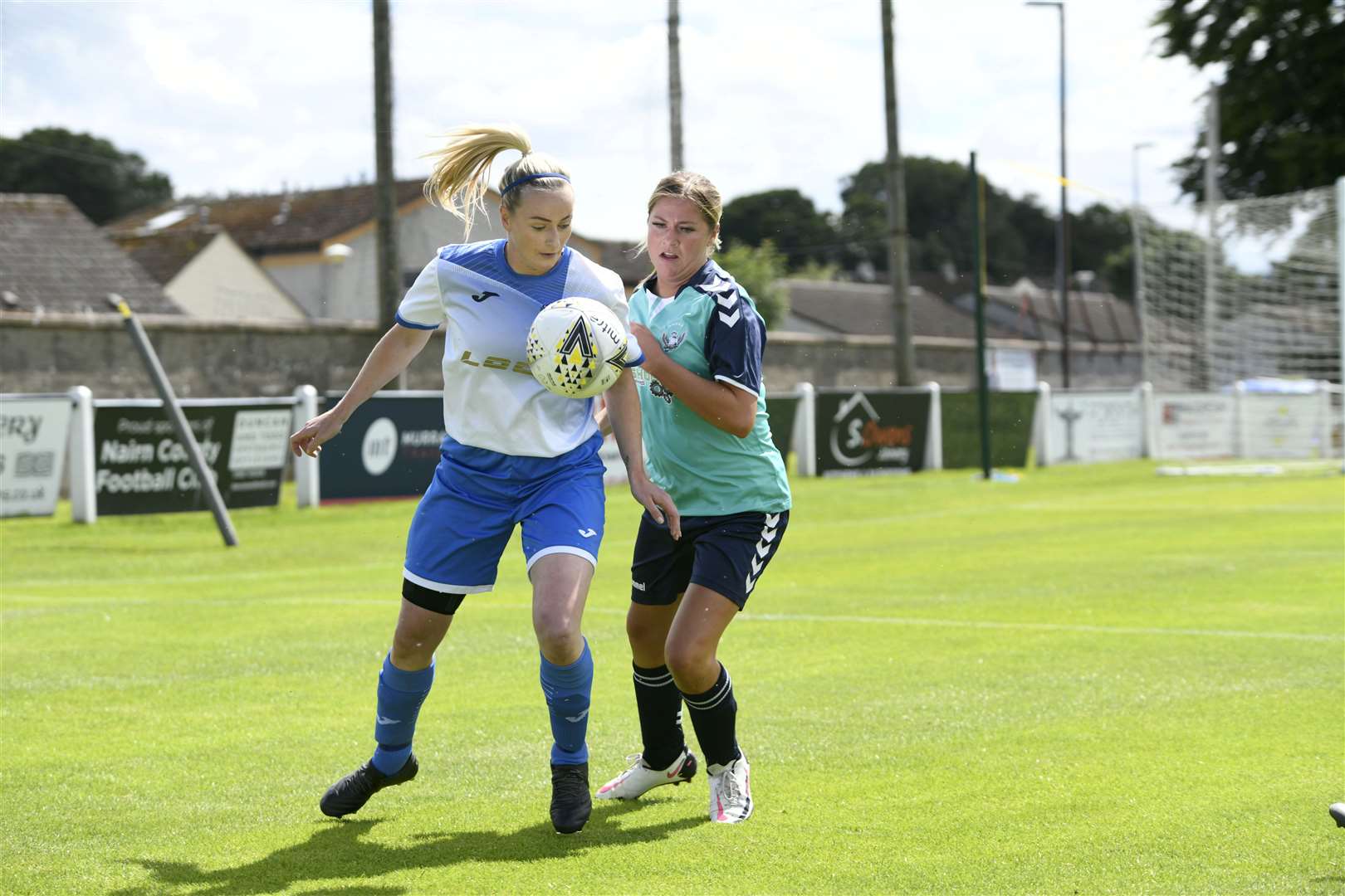 Buckie Ladies FC's Kayleigh Stalker and Sutherland Womens FC's Tracy-Anne Montgomery both trying to get the ball...Highlands and Islands League Cup Final in Nairn...Picture: Beth Taylor.