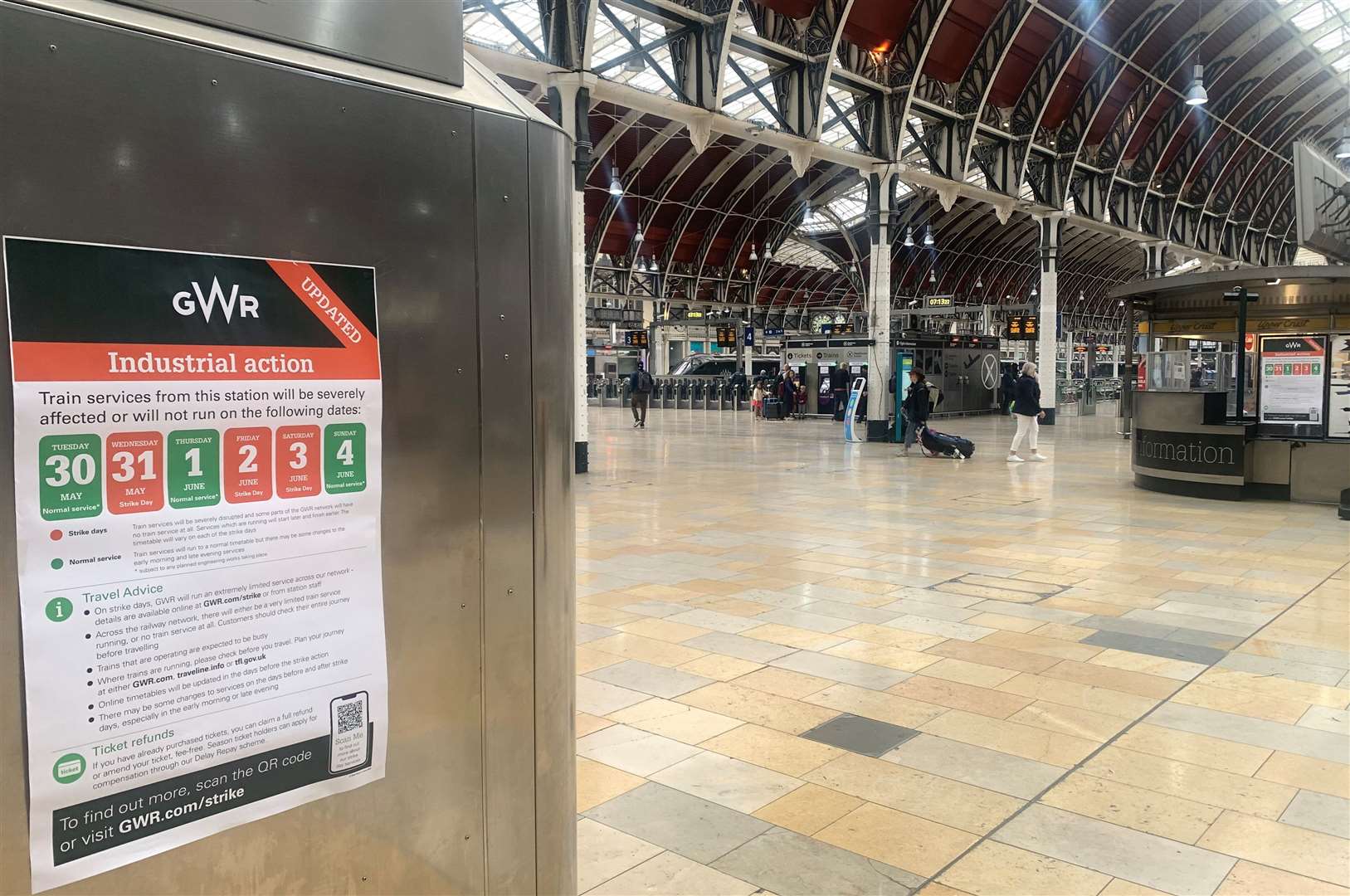 Strike signage in a quiet Paddington station in London (Peter Clifton/PA)