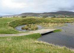 Part of the flooded Brora course on Saturday.