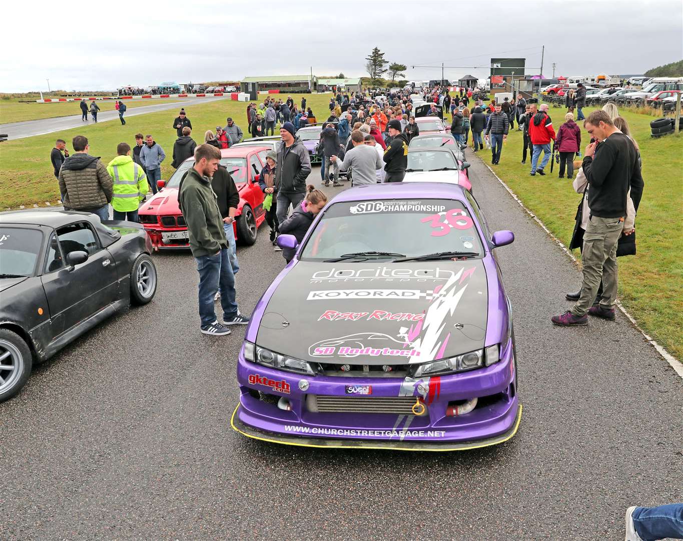 Spectators get the opportunity to see the cars up close and speak to drivers at the Drift Scotland event in Golspie. Picture: James Gunn
