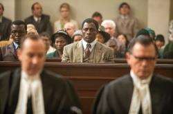 Mandela (Idris Elba) faces charges of treason.