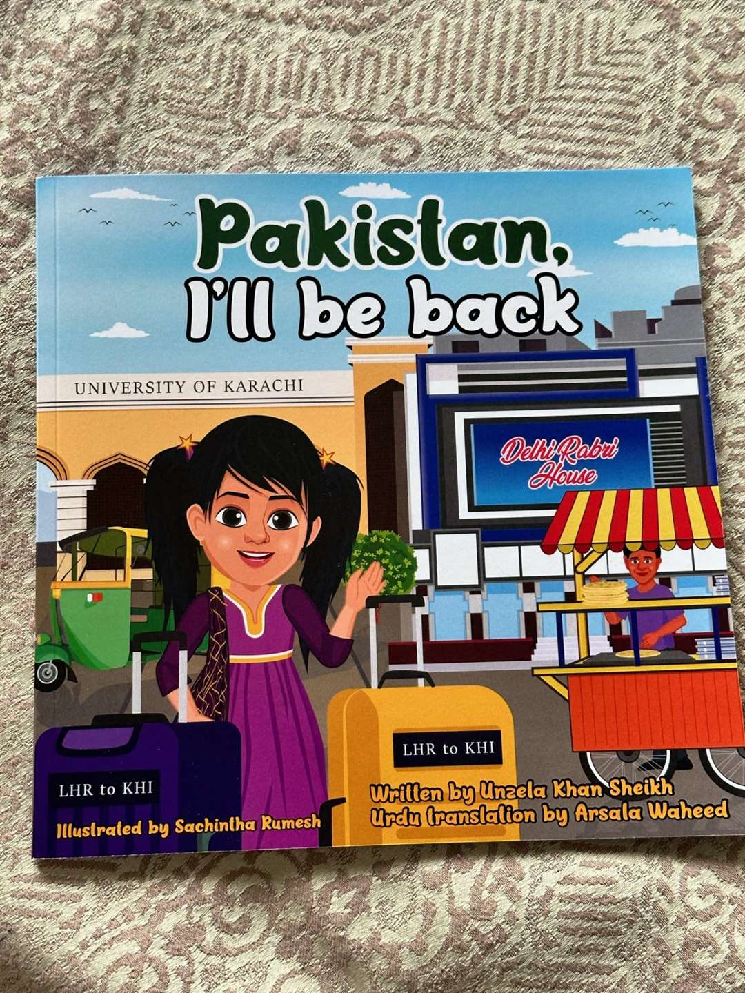 The book, based on Unzela Khan Sheikh’s memories of her visits to Pakistan, features illustrations of her own family members (Unzela Khan Sheikh/PA)