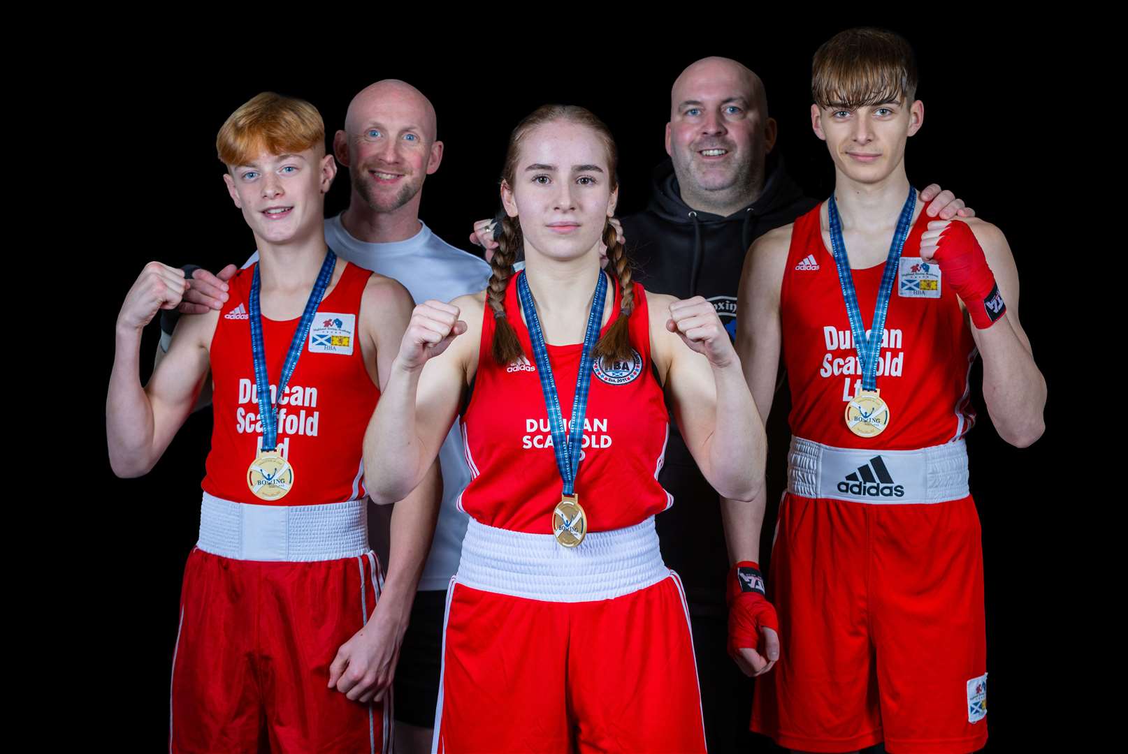 Tain's Isabella Fioretti (centre) was triumphant at the 2023 Scottish Development Championships with Highland Boxing Academy.