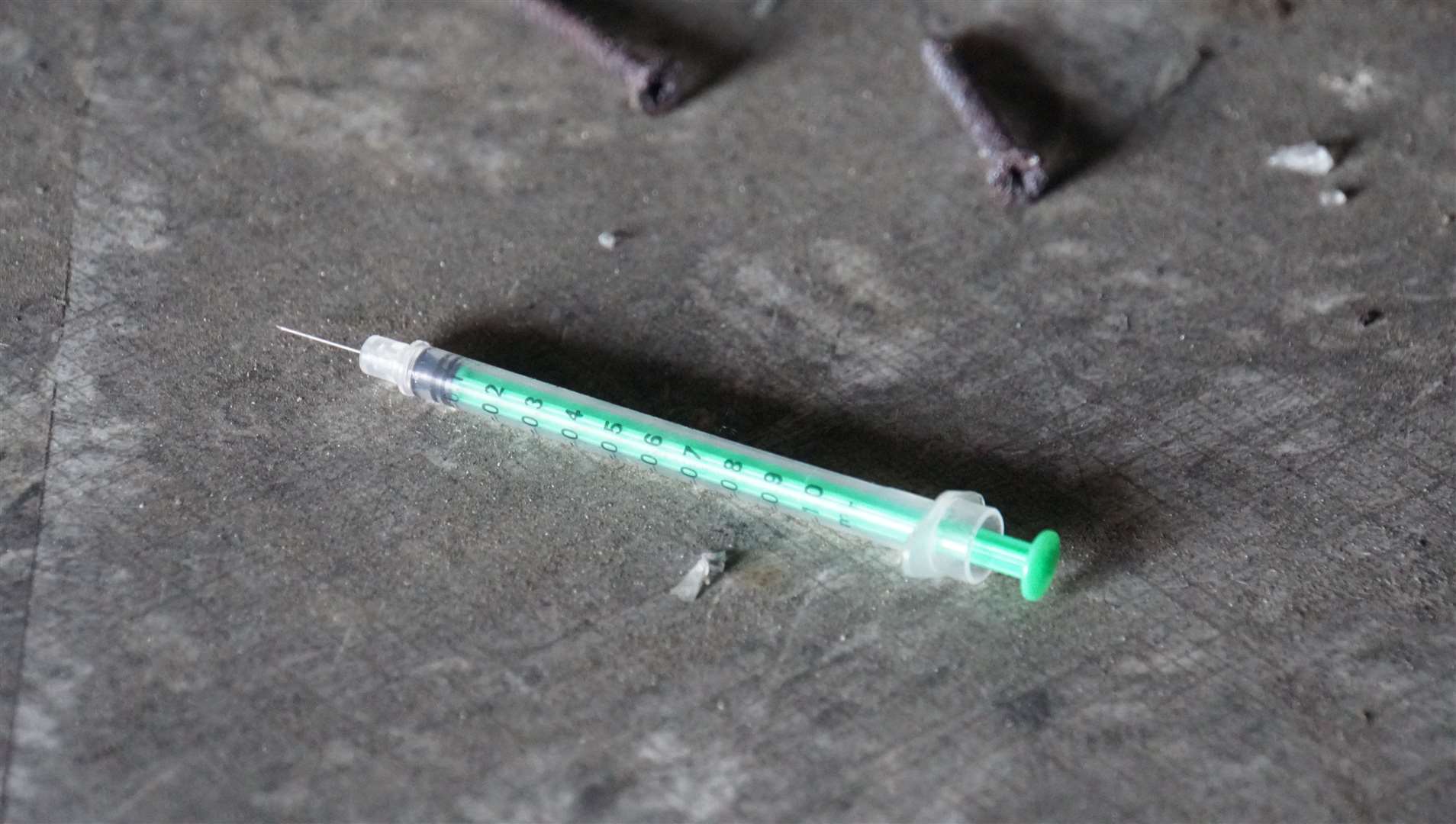 An open syringe that may have been used for injecting heroin found lying in an abandoned house in Wick. Picture: DGS