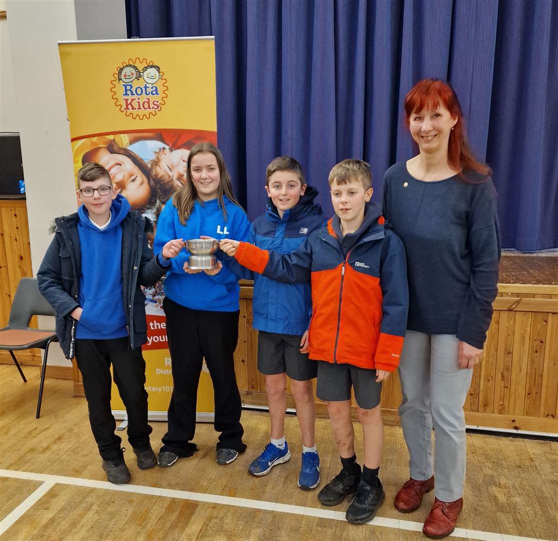 Rotary club youth chairperson Claudia Macgregor with the winning team from Dornoch who now go forward to the final of the quiz at the Beach Ballroom, Aberdeen.