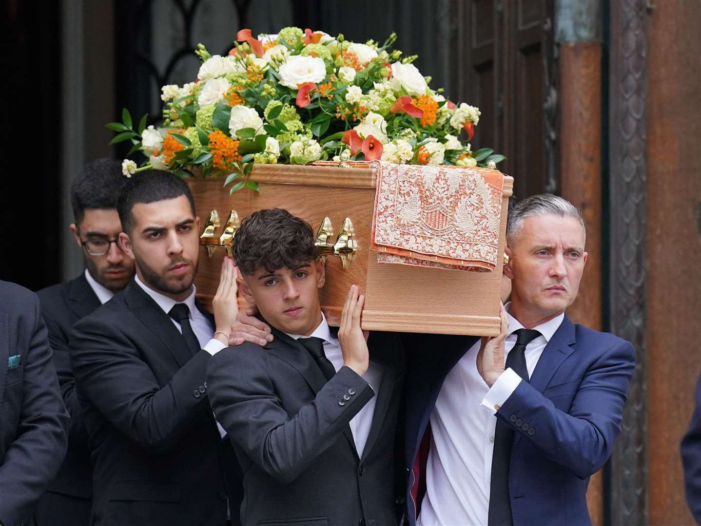 Grace O’Malley-Kumar’s coffin is carried from her funeral at Westminster Cathedral (Jonathan Brady/PA)