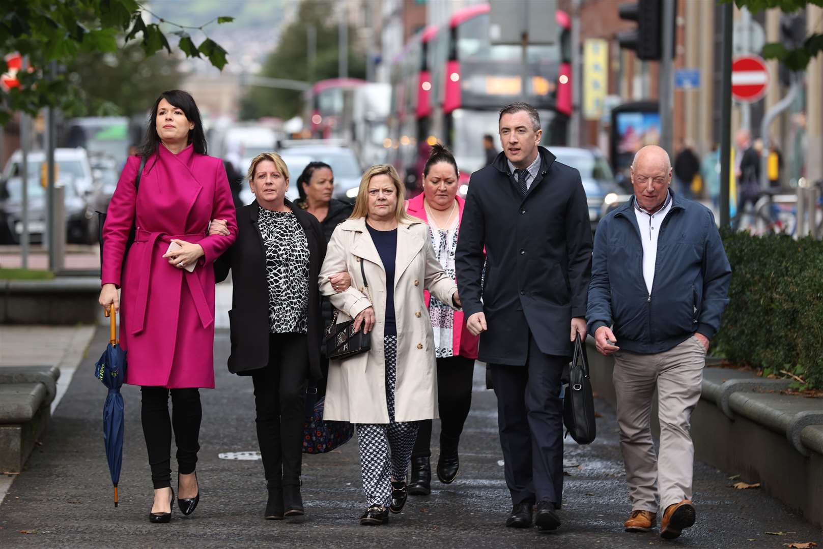 (left to right) Grainne Teggart, deputy director of Amnesty International in Northern Ireland, with Martina Dillon, wife of Seamus Dillon, (unknown), sisters Lynda and Isobel McManus, daughter’s James McManus, Gavin Booth of Phoenix Law, and Peter McCarthy walking to the Royal Courts of Justice (Liam McBurney/PA)