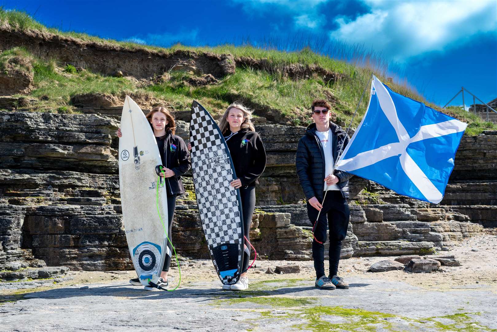 Olivia Mackay (left), Nadia Murray and Craig McLachlan near the North Shore Surf Club base in Thurso. Picture: Malcolm Anderson