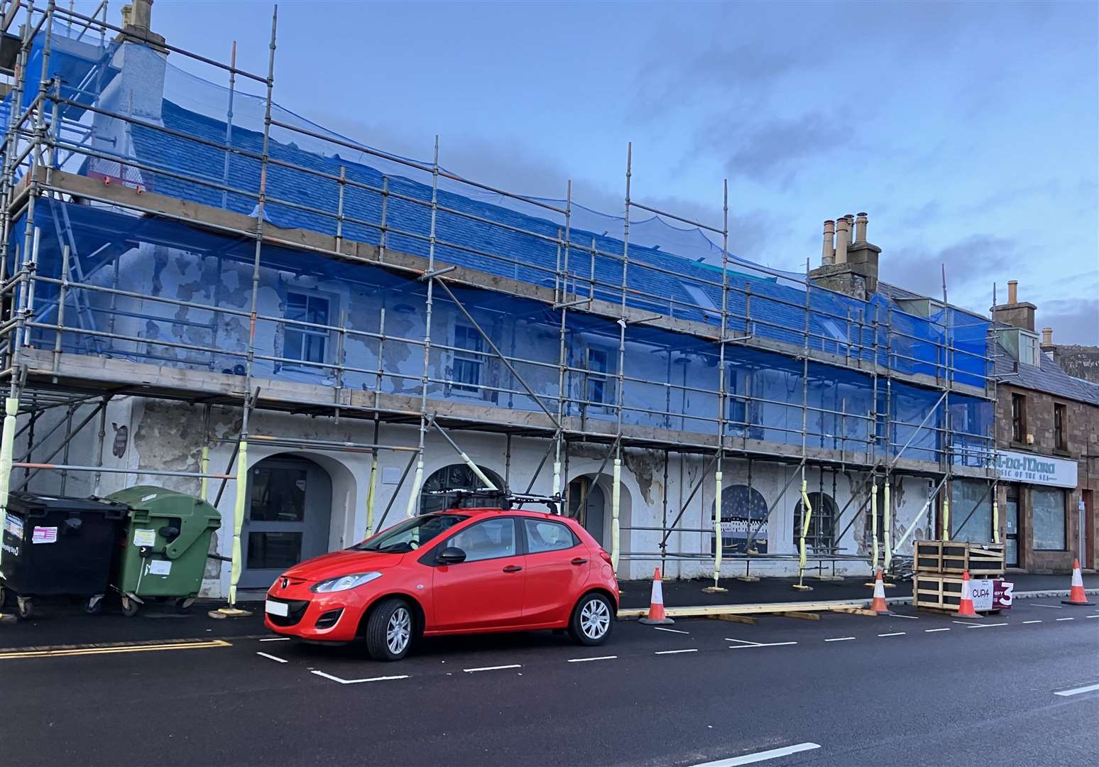The old Frigate Bar and Bistro building being renovated into the new Rhidorroch Distillery Café and Bar, on Ullapool's Shore St, February 2024.