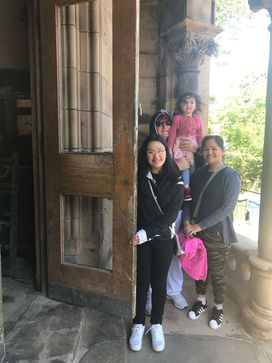Opening the doors of the Picture House with her family.