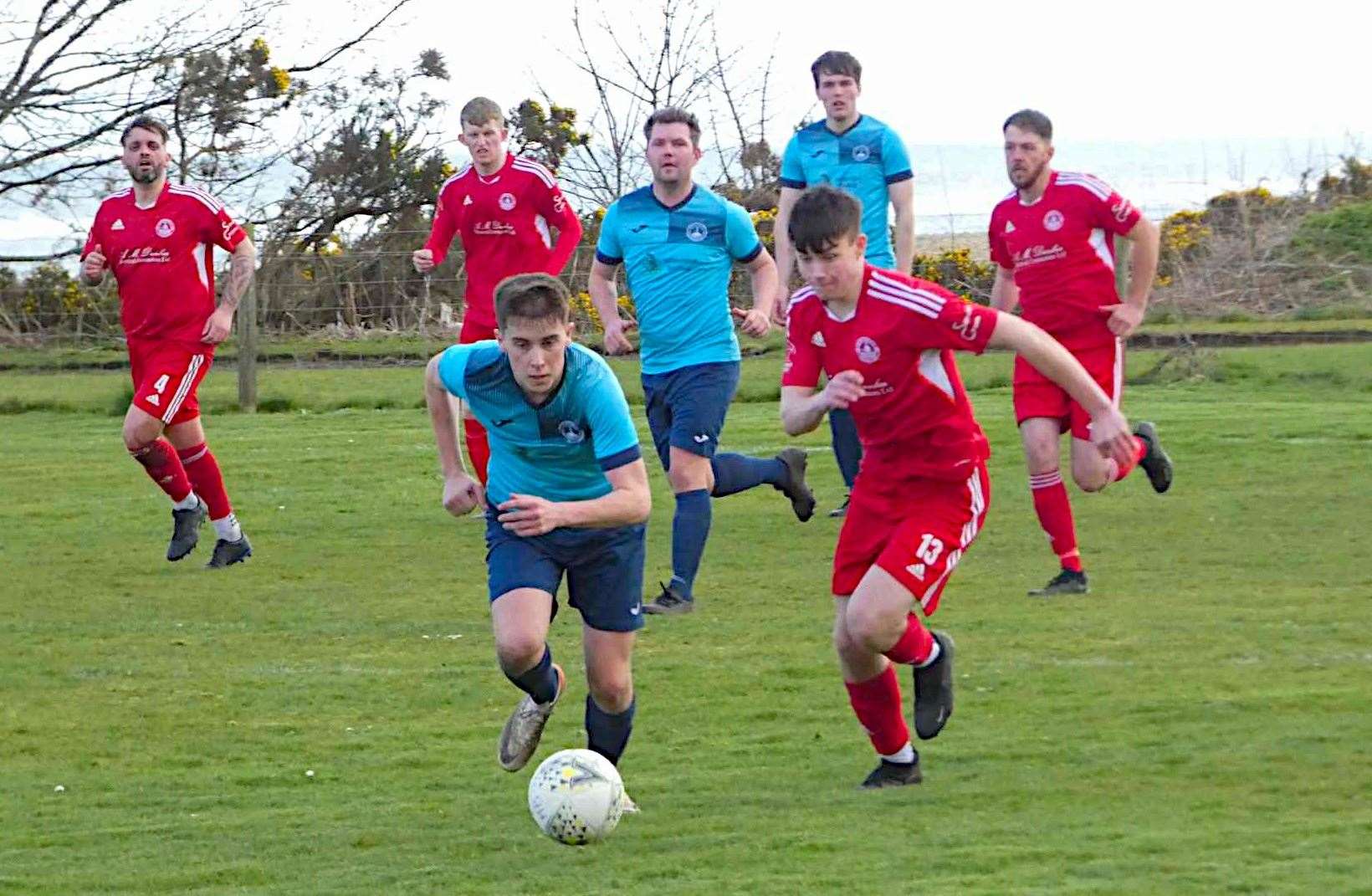 Golspie Stafford's Matthew Aitkenhead and Kegan Mullins of Brora Wanderers compete for the ball. Picture: Justine Clark
