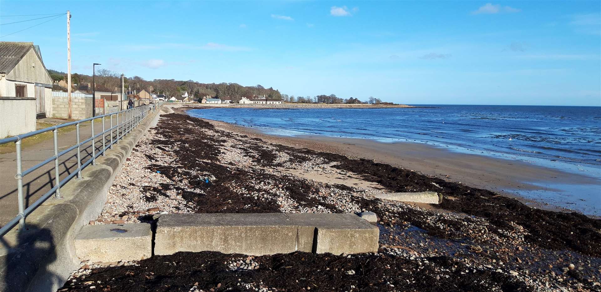 The existing breakwater, which can be seen at low tide, lies some way out from the front shore at Golspie.