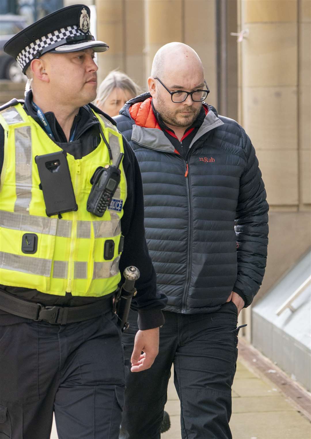 Pc Alan Smith (right) arrives at Capital House in Edinburgh for the public inquiry into Sheku Bayoh’s death (Jane Barlow/PA)
