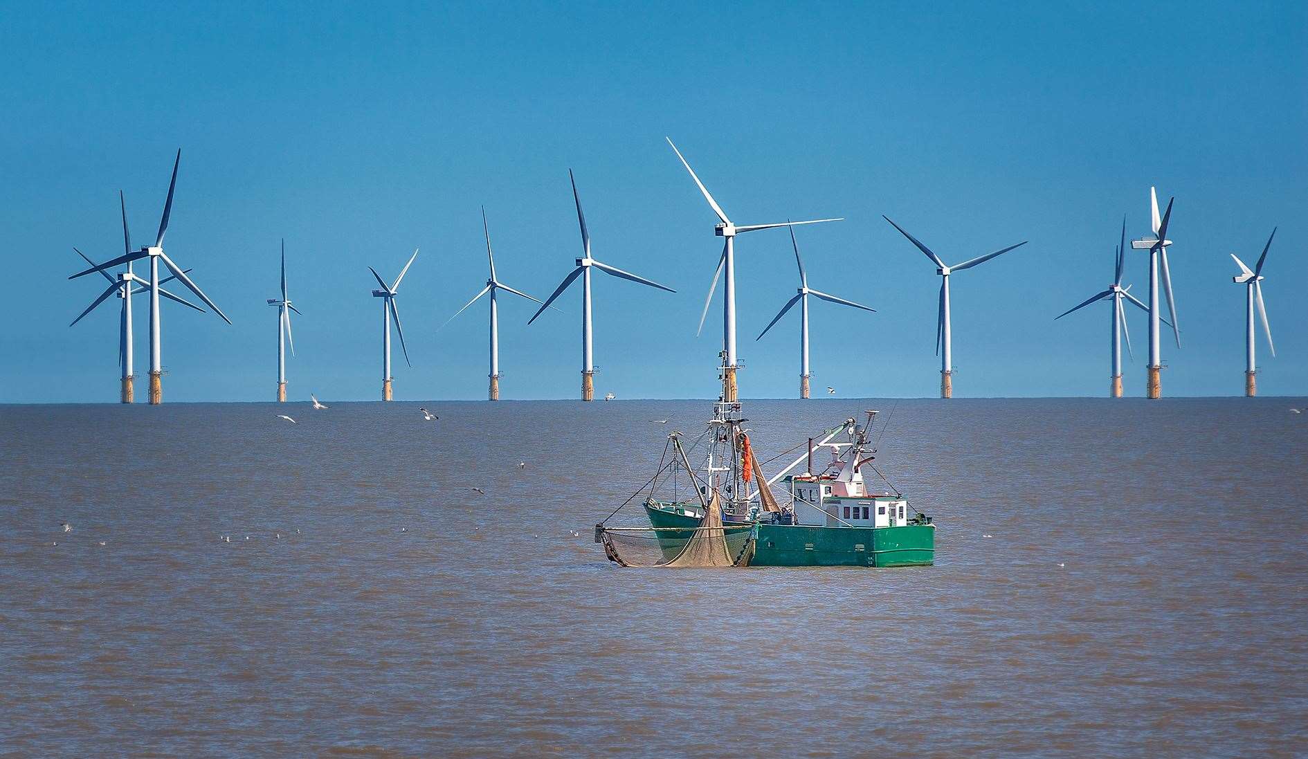 Off shire wind turbine and fishing boat