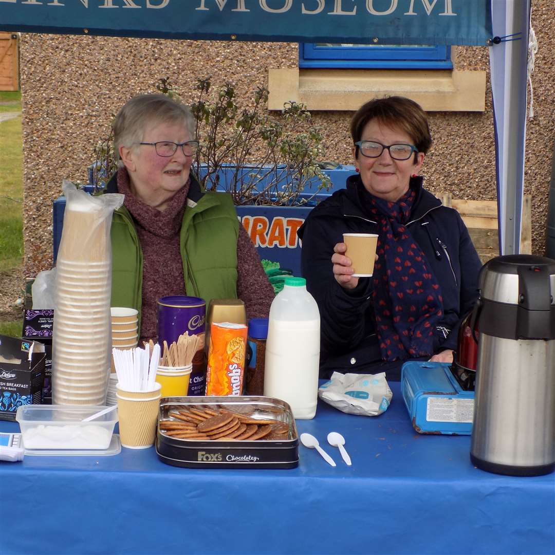 Museum volunteers Hazel Cameron and Sandee Mackenzie man a tea stall.