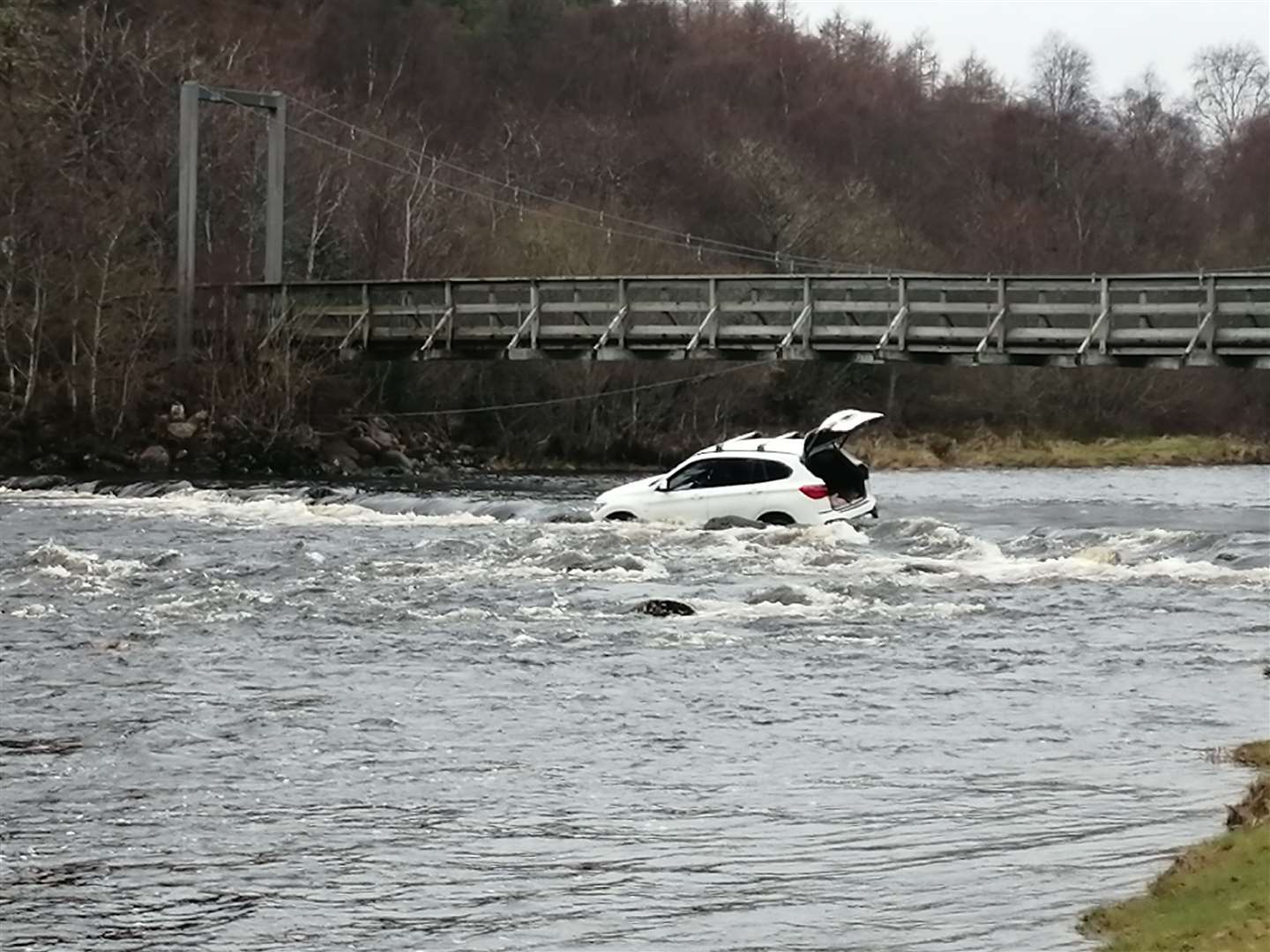The car floating in the River Brora. Picture: John Murray (Biba)