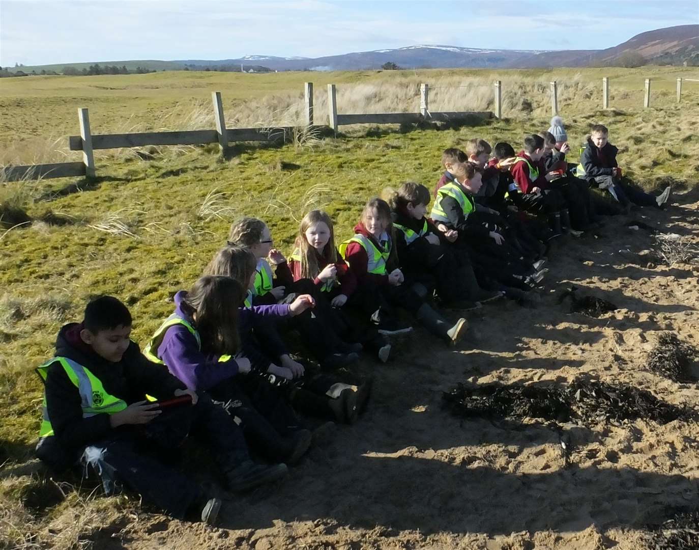 Brora Primary School children take a well earned rest from their hard work with a rewarding cup of hot chocolate.
