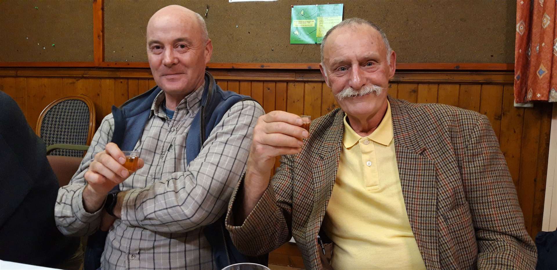 David Jackson, Rogart (right) and William Anderson, Dunbeath, enjoy a tot of mead.