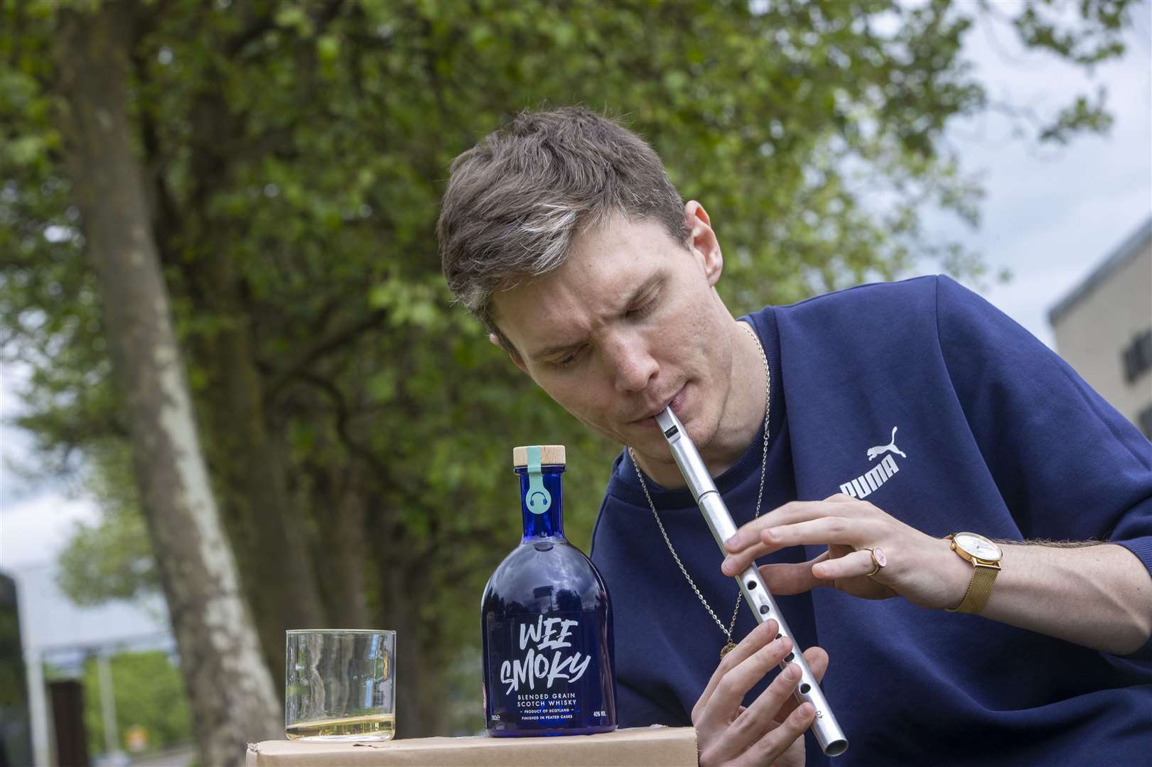 Ali Levack from Dingwall plays to a bottle of Wee Smoky.