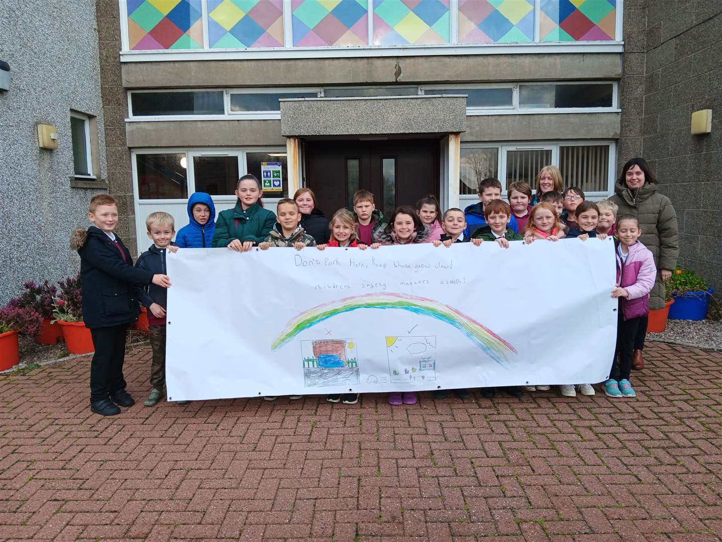 The school's road safety committee, which comprises p5 and p6 pupils, have designed a road safety banner.