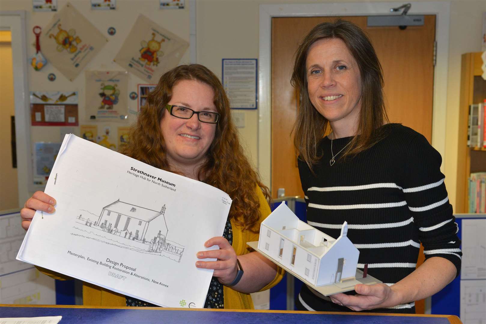 Museum development officer with architect Catriona Hill show off the design proposal for Strathnaver Museum at a public presentation in 2019.