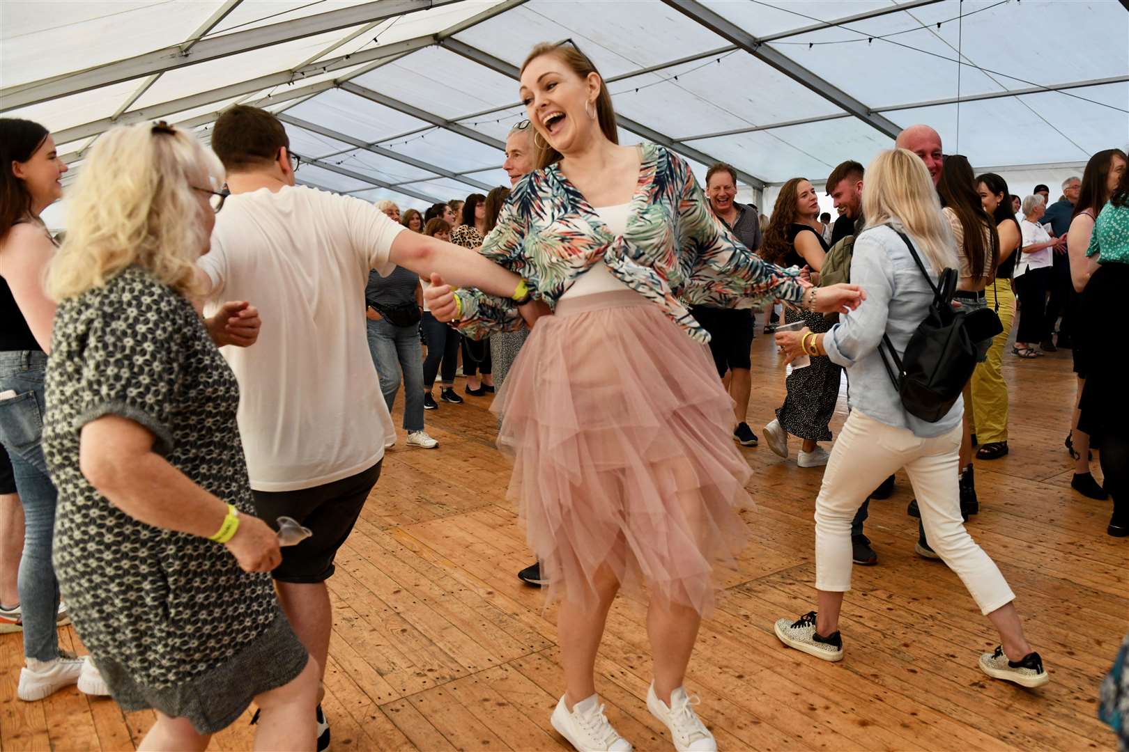 Music fans filling the dance floor at Tunes By the Dunes 2023. © John Wright Studio