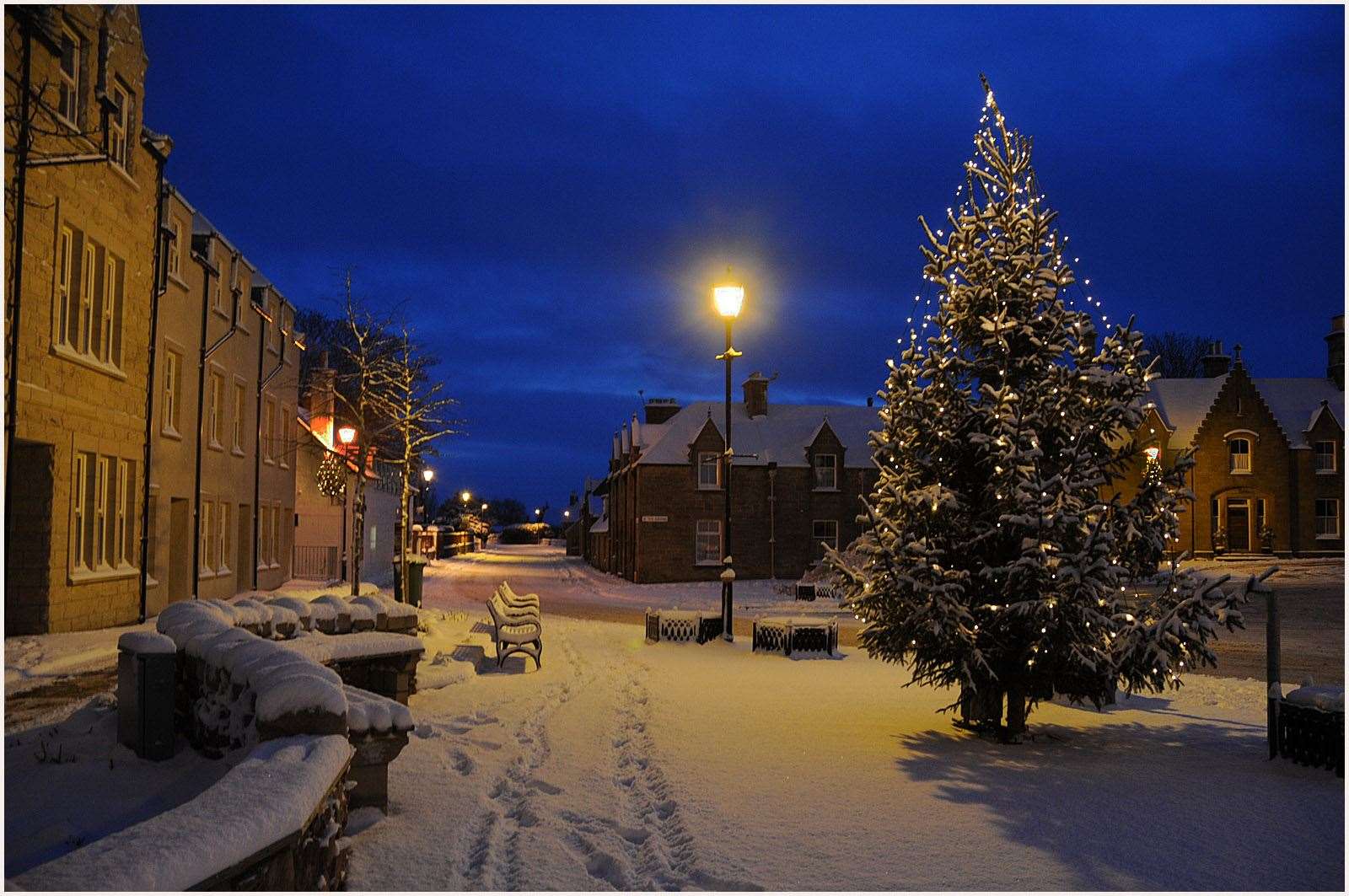 The street lights of Dornoch earned Willie Skinner first place in the colour section with December Snow.