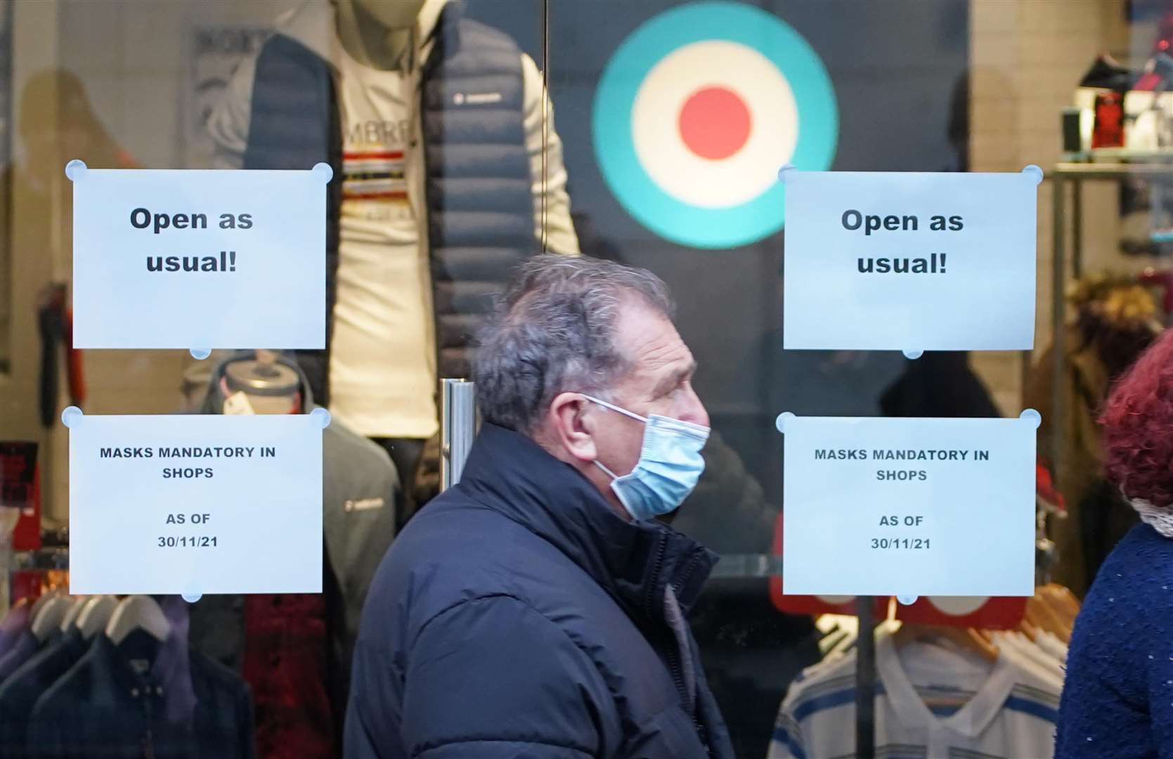 Masks will no longer be needed in shops from Thursday next week (Peter Byrne/PA)