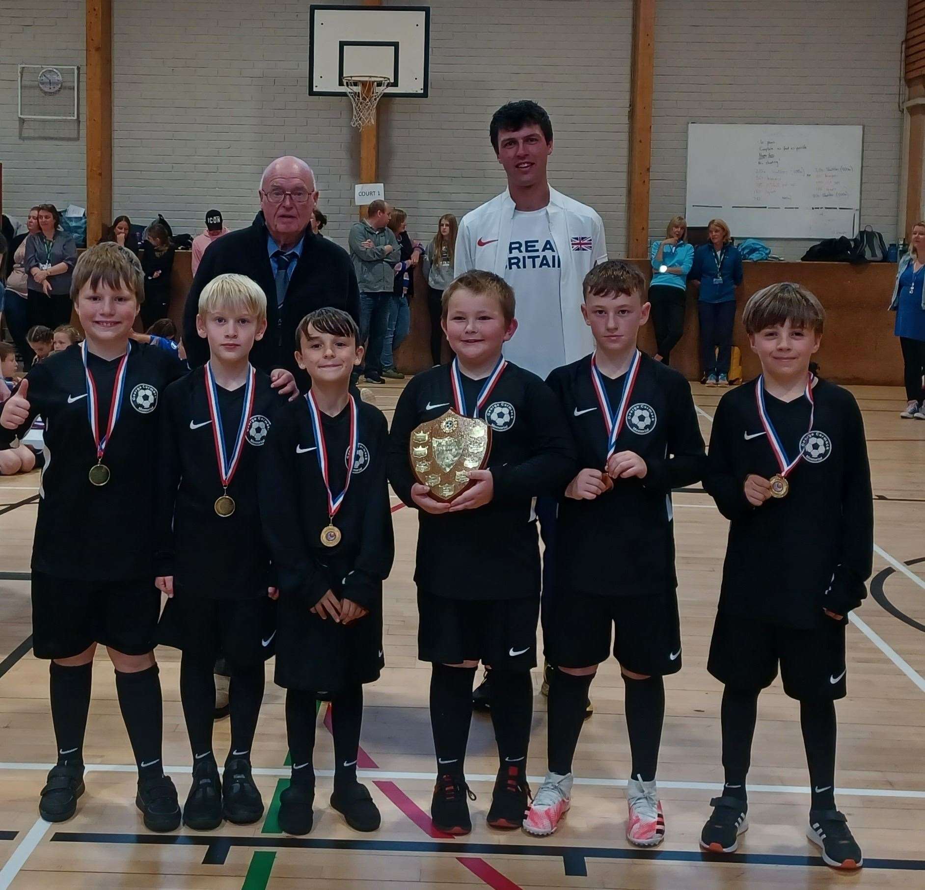A handsome trophy for Helmsdale after the school's team won the Small Schools boys' class.