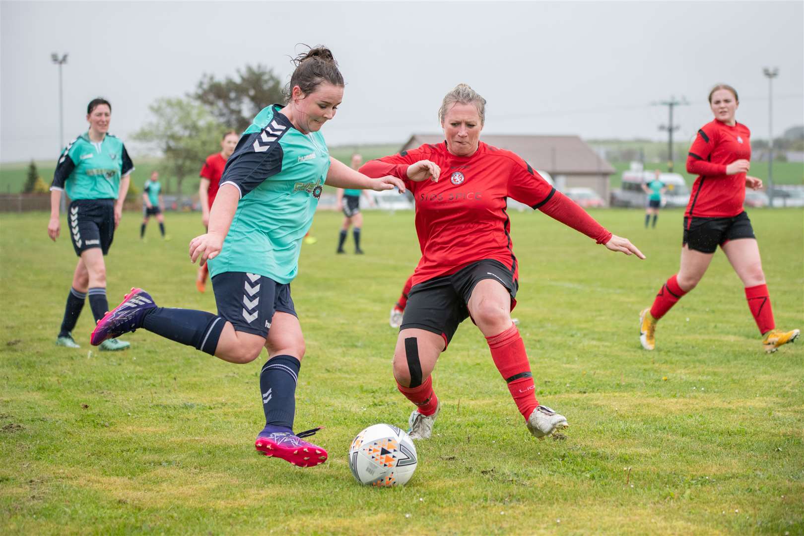 Brora's Mary Stewart makes a challenge on Buckie's Alena Gardiner in Highlands and Islands League action earlier this season. Picture: Daniel Forsyth