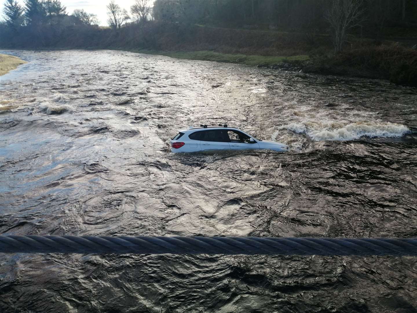 The car floated in the river for two days before being removed. Picture: John Murray (Biba)
