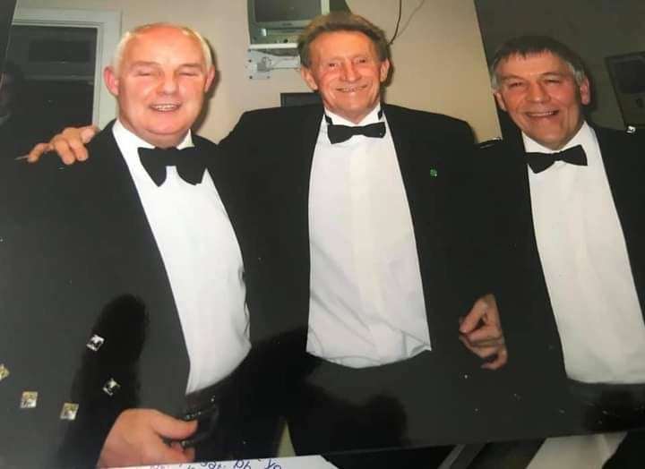 Calum Grant, is far left here, with legendary Manchester United and Scotland striker, Dennis Law, at a Ross County FC function.