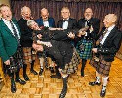 in the picture are (L-R): Adrian Baggott, Wilson Blair, Willie Mackay, Billy Mackay, Rob Murray and Charles Wood. Pretending to hold Isabella on his back is Russell Mackenzie.