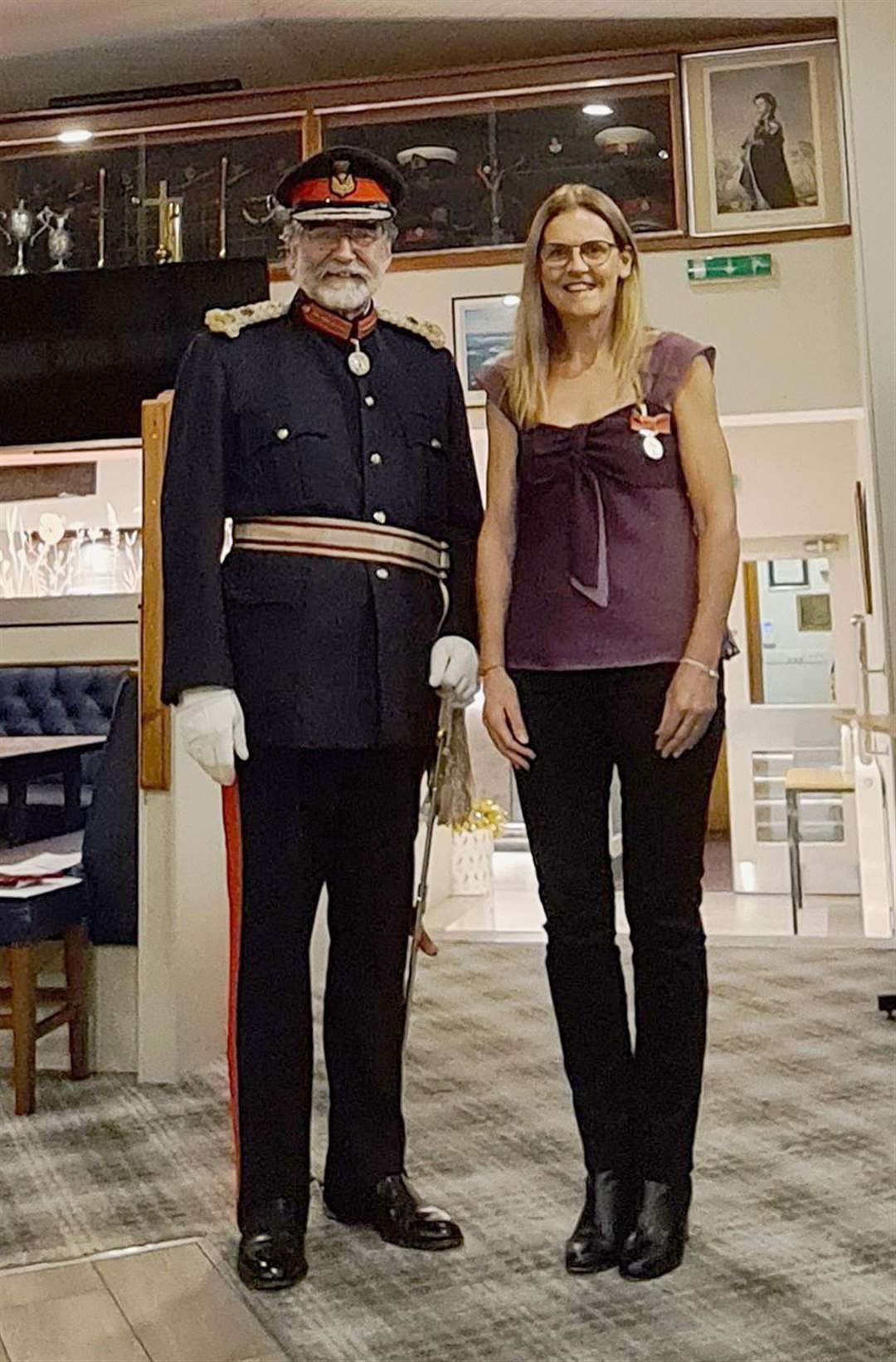 Sophie Dunnett after being presented with her British Empire Medal by Lord Thurso, the Lord-Lieutenant of Caithness.