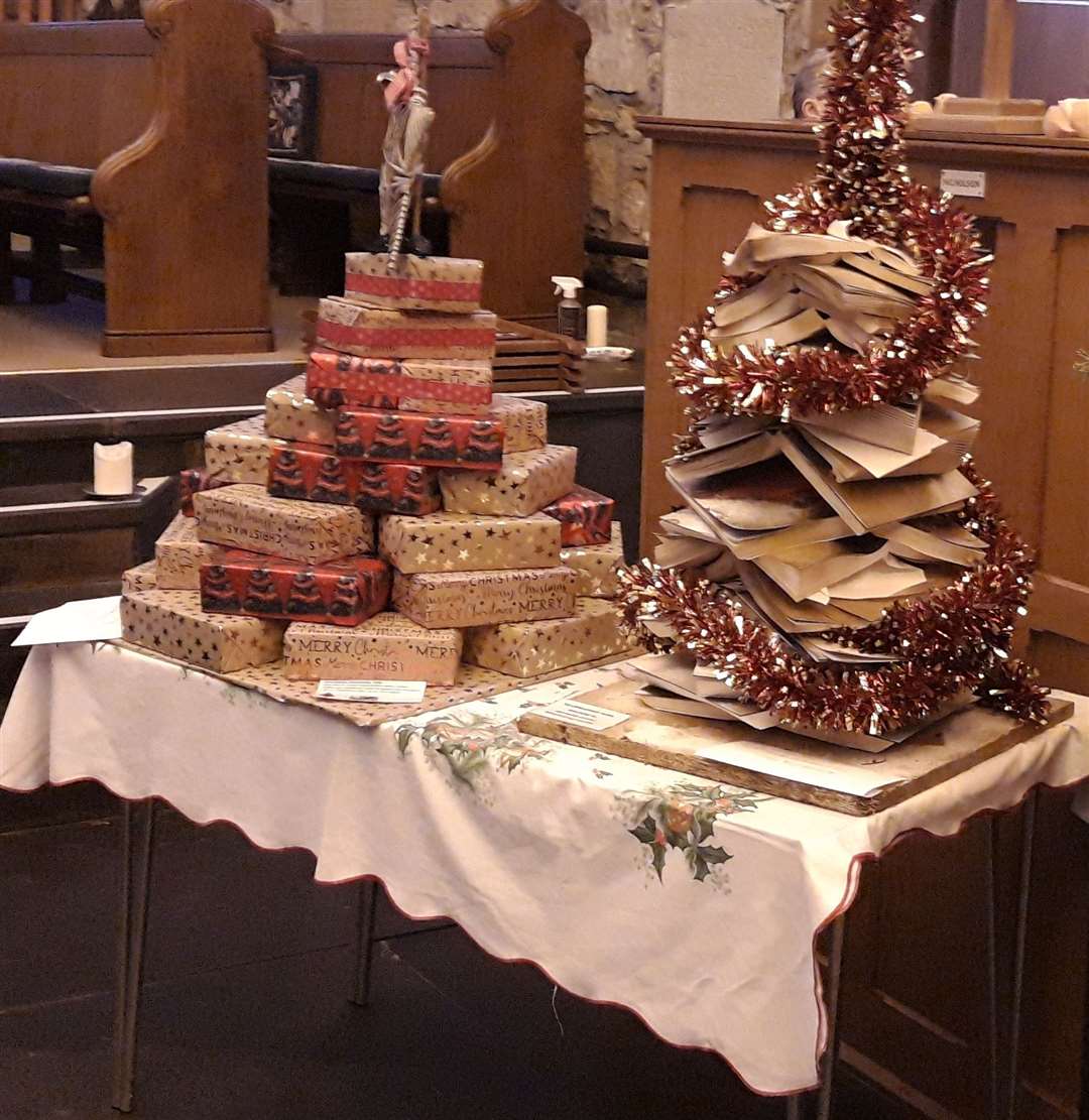 Dornoch Bookshop's literary tree (right) sits beside the offering from Oversteps Care Home.