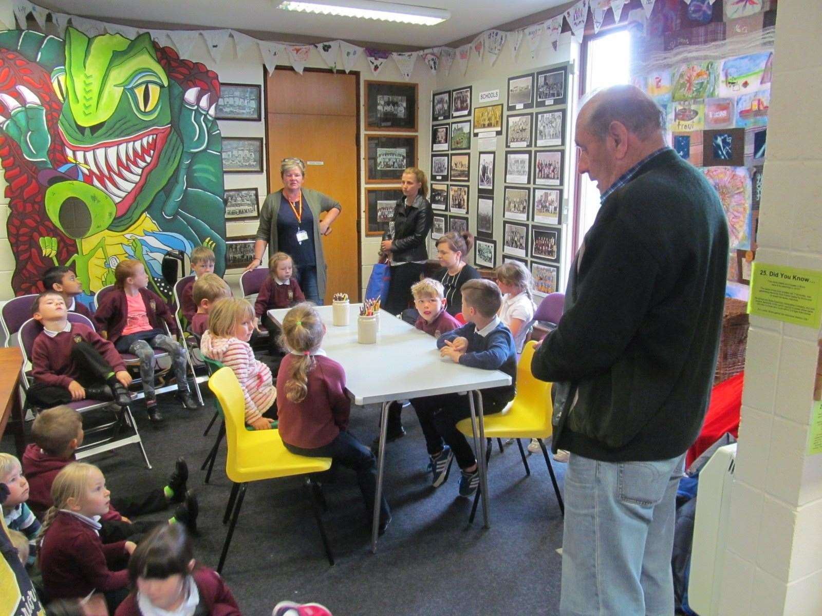 George MacBeath telling stories of the old ways to Brora Primary School pupils