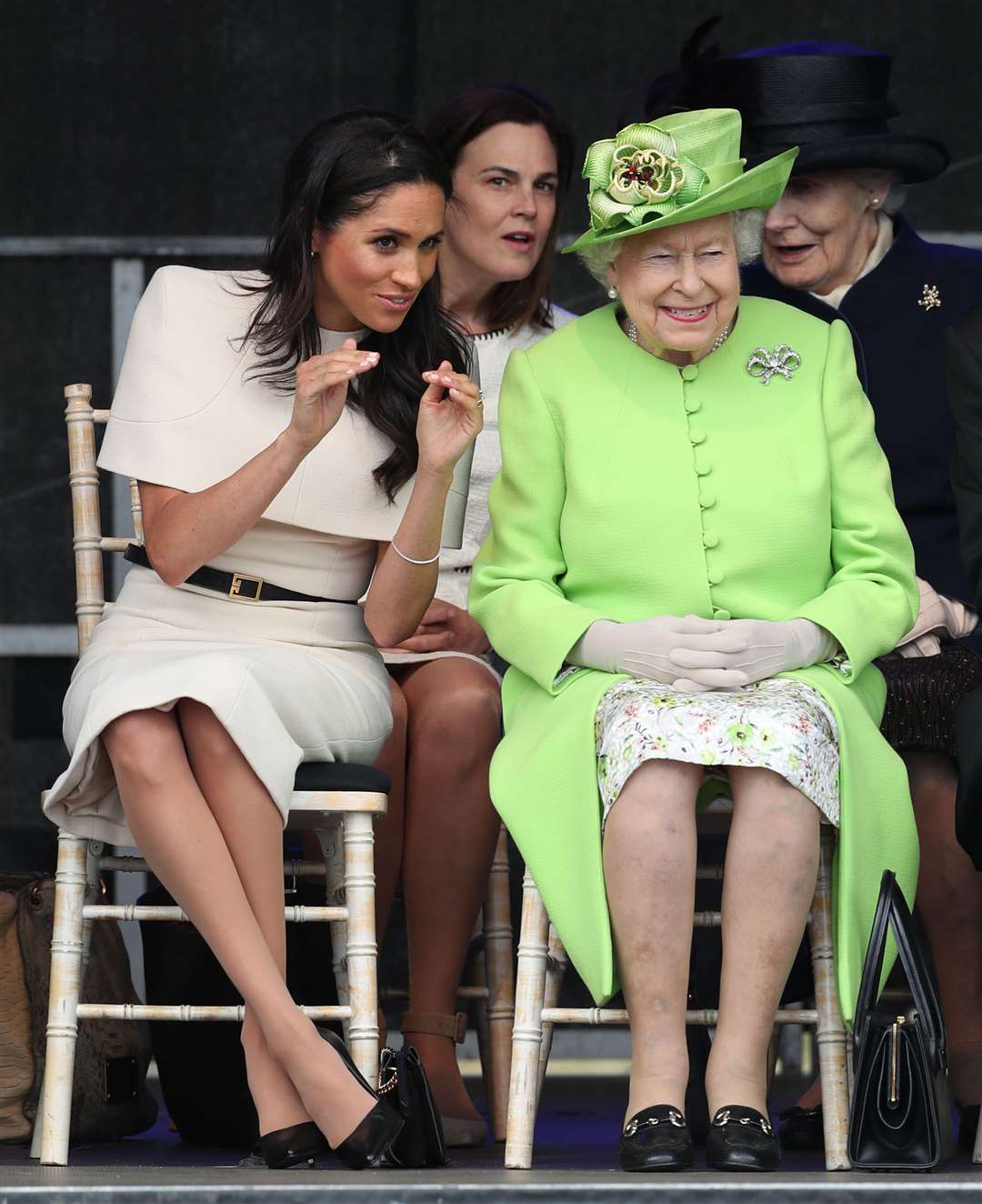 The Duchess of Sussex is seen speaking to the Queen at the opening of the new Mersey Gateway Bridge, in Widnes, Cheshire (Danny Lawson/PA)