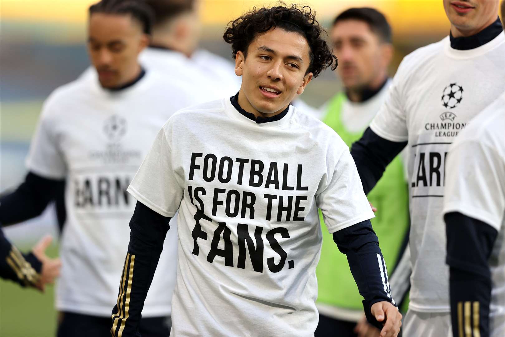 Leeds United player Ian Poveda wore a ‘Football Is For The Fans’ shirt as he warmed up before Monday’s match against Liverpool (Clive Brunskill/PA)