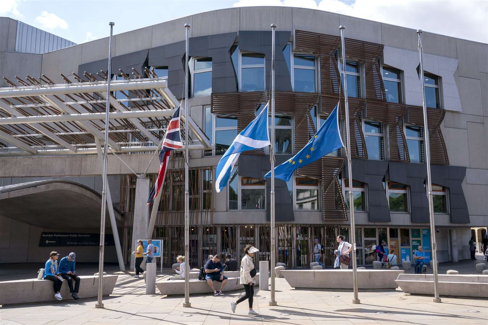 Flags flew at half-mast outside the Scottish Parliament in Holyrood, Edinburgh, following Mrs Ewing’s death (Jane Barlow/PA)