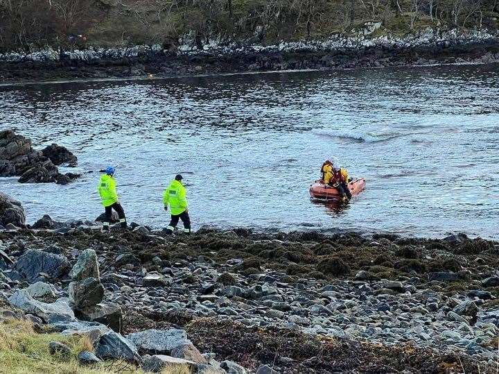 Coastguards searching the shoreline today. Picture: RNLI Lochinver