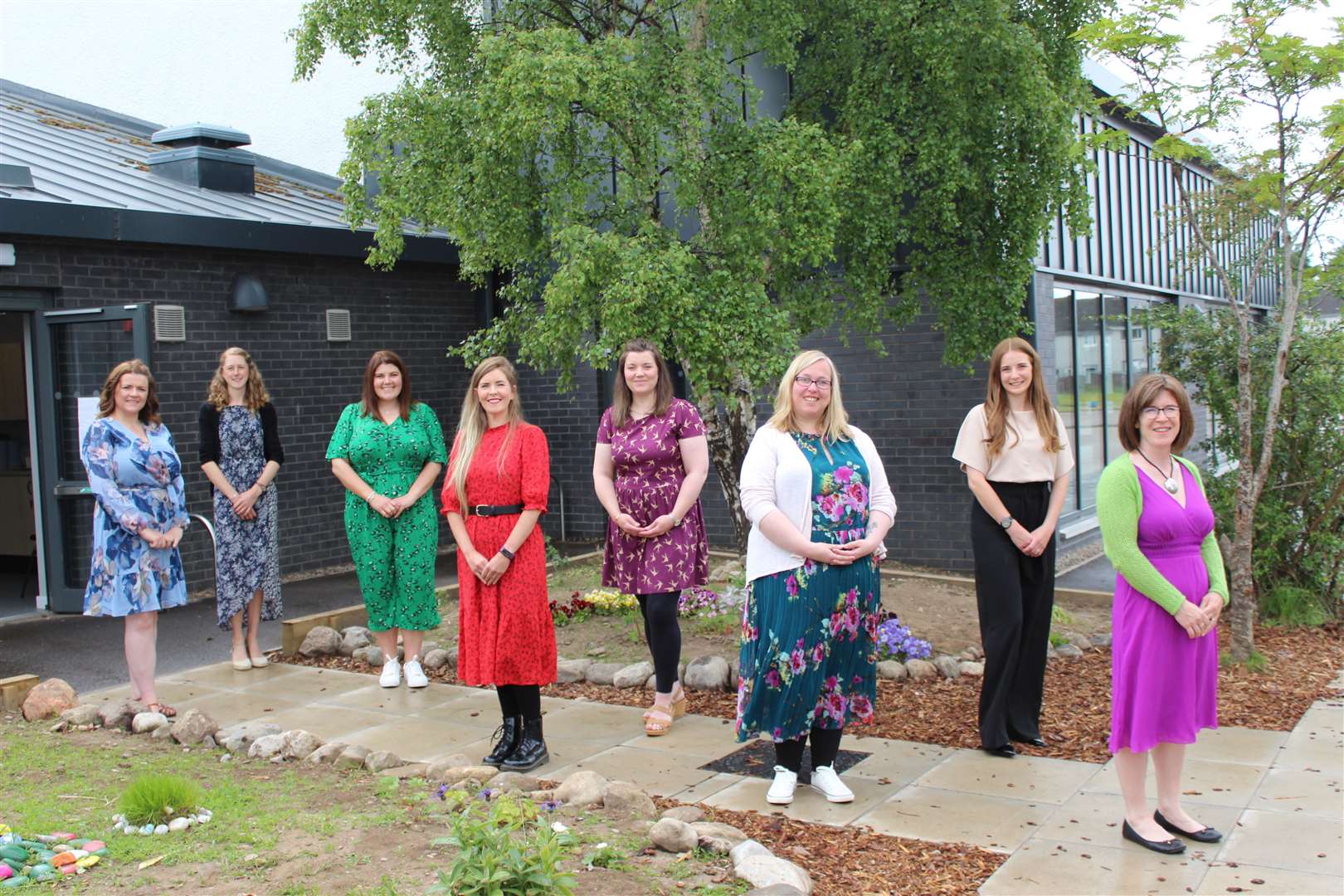DLITE graduates outside Smithton Primary (from left): Lindsay McGarry, Rachel Buckley, Lindsey Anderson, Melissa Maclean, Judith Munro, Karen Gunn, Kelly Gorman and Laela Winkelmann.