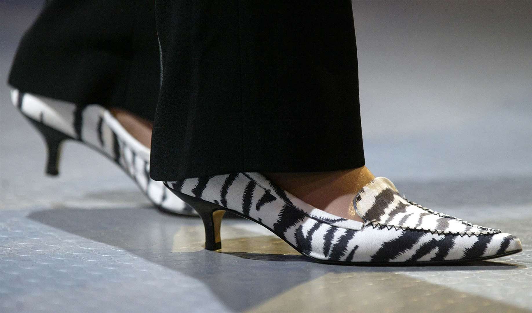 Theresa May is known for her distinctive taste in shoes (Owen Humphreys/PA)