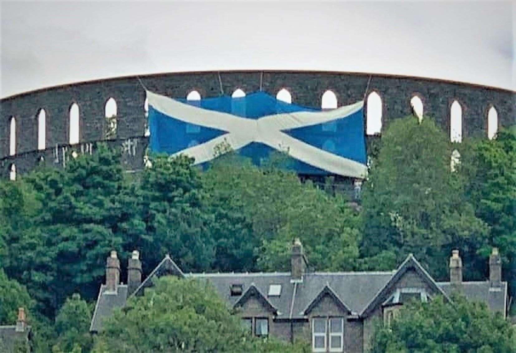 The giant saltire flag was draped on McCaig’s Tower at Oban last month.. It measures 72-feet long.