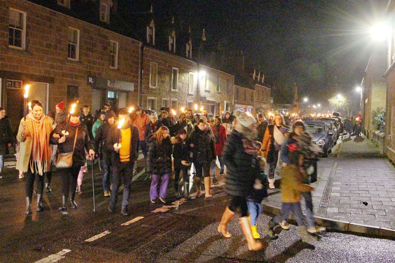 The torchlight parade marched from the town Square to Meadows Park. Picture: David Richardson