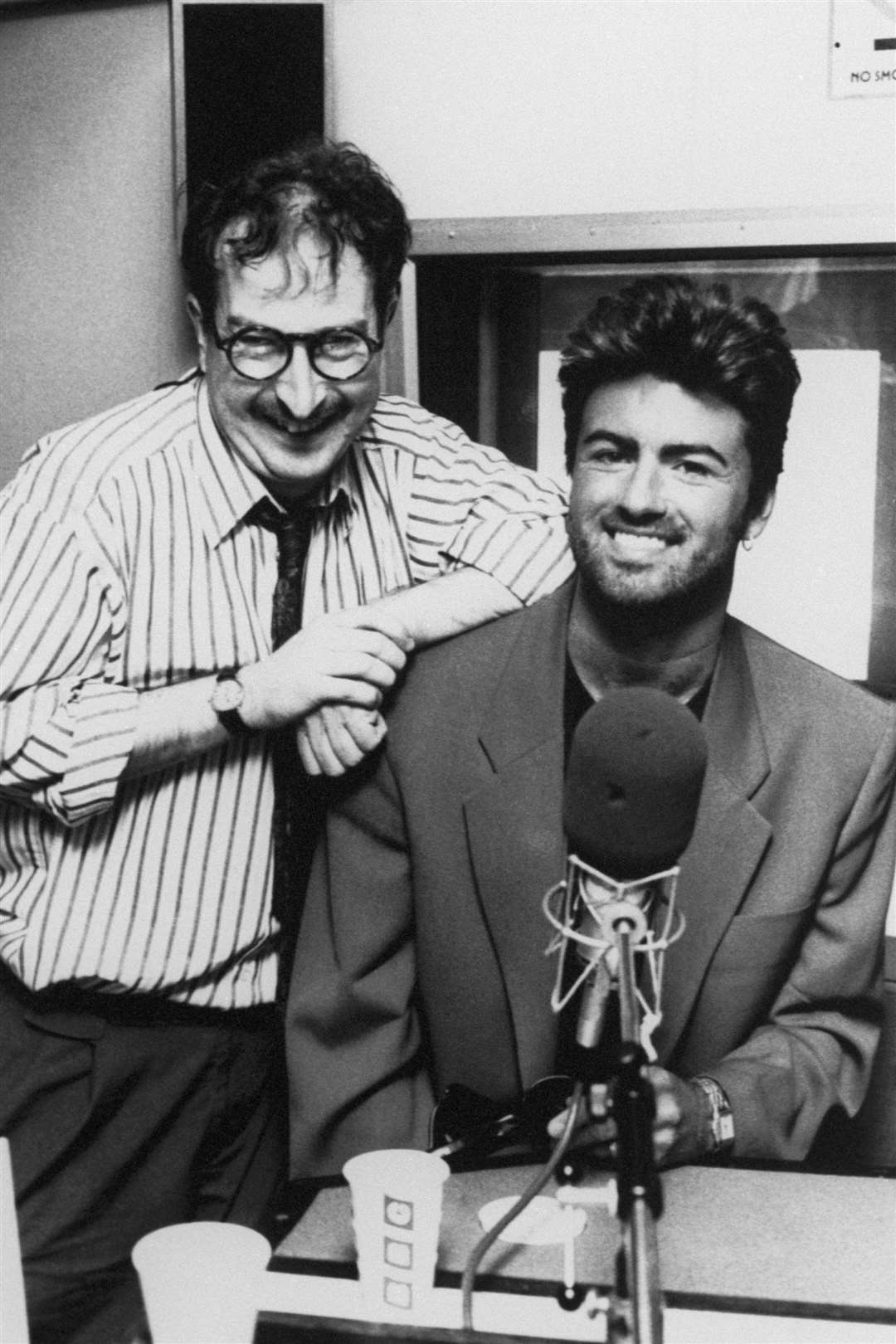 Singer George Michael, right, with Steve Wright (PA)