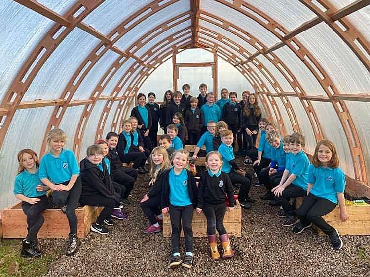 The primary school pupils inside the new timber tunnel. Picture: Melvich Primary School.