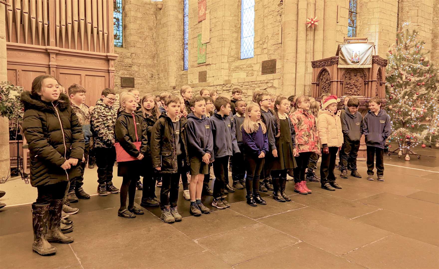 P4s and P5s sang the 'Christmas Calypso' to entertain the crowds.